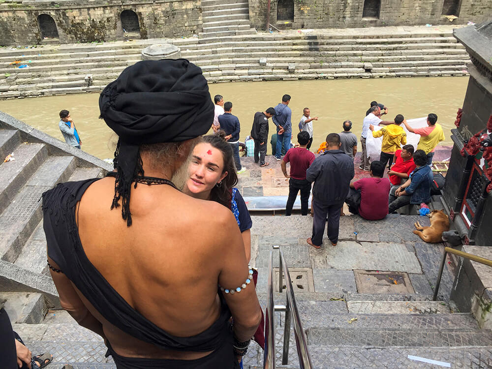 Agori Nath, Ishanath, lectures and guides the students on the 2019 Nepal Yoga Teacher Training aroung Pashupati Ghat in Nepal.