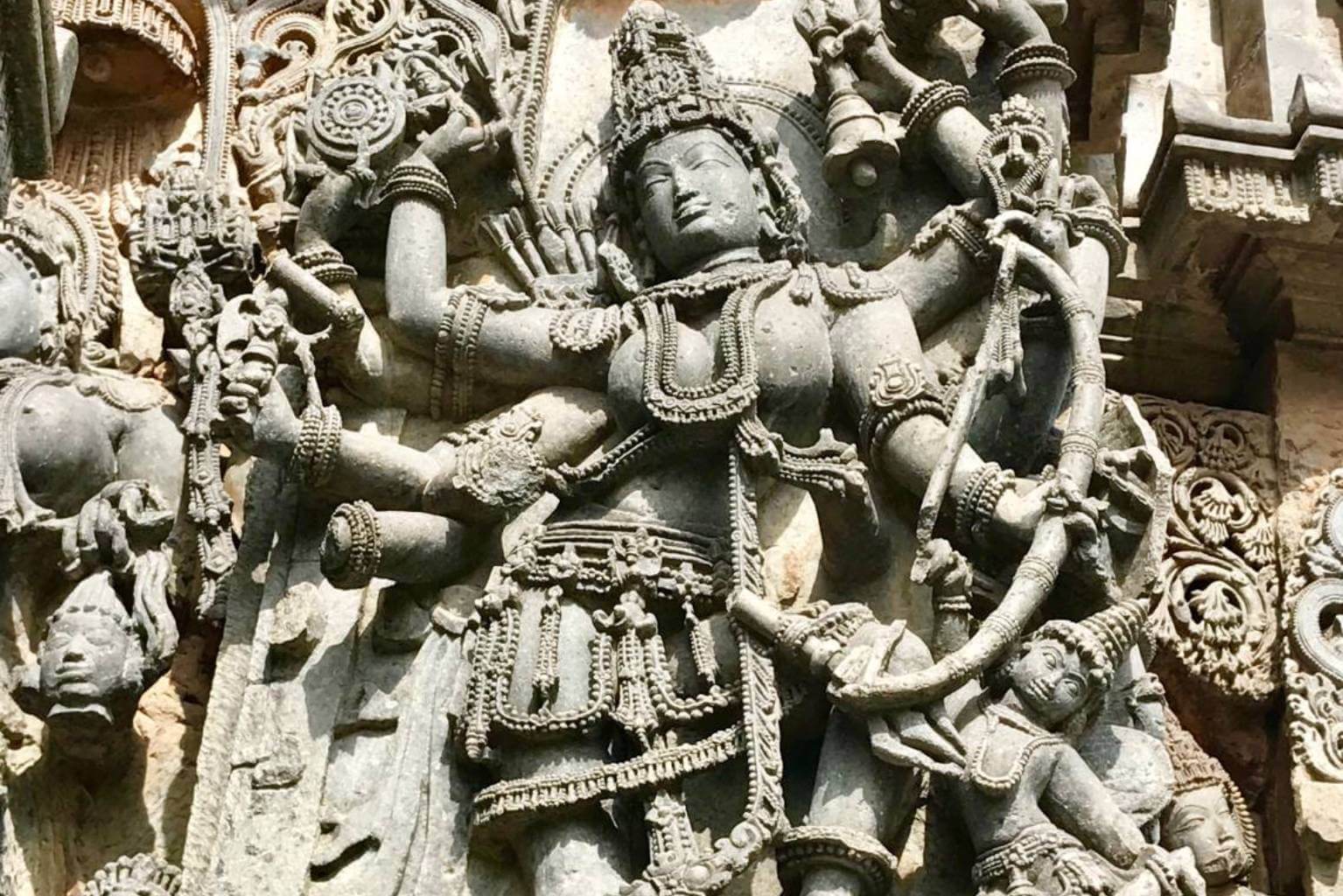 Crop of Durga as Mahishasuramardini killing the buffalo demon. Hoysala Empire era sculpture, 12th century. Halebid, Karnataka, India. ©Heather Elton
