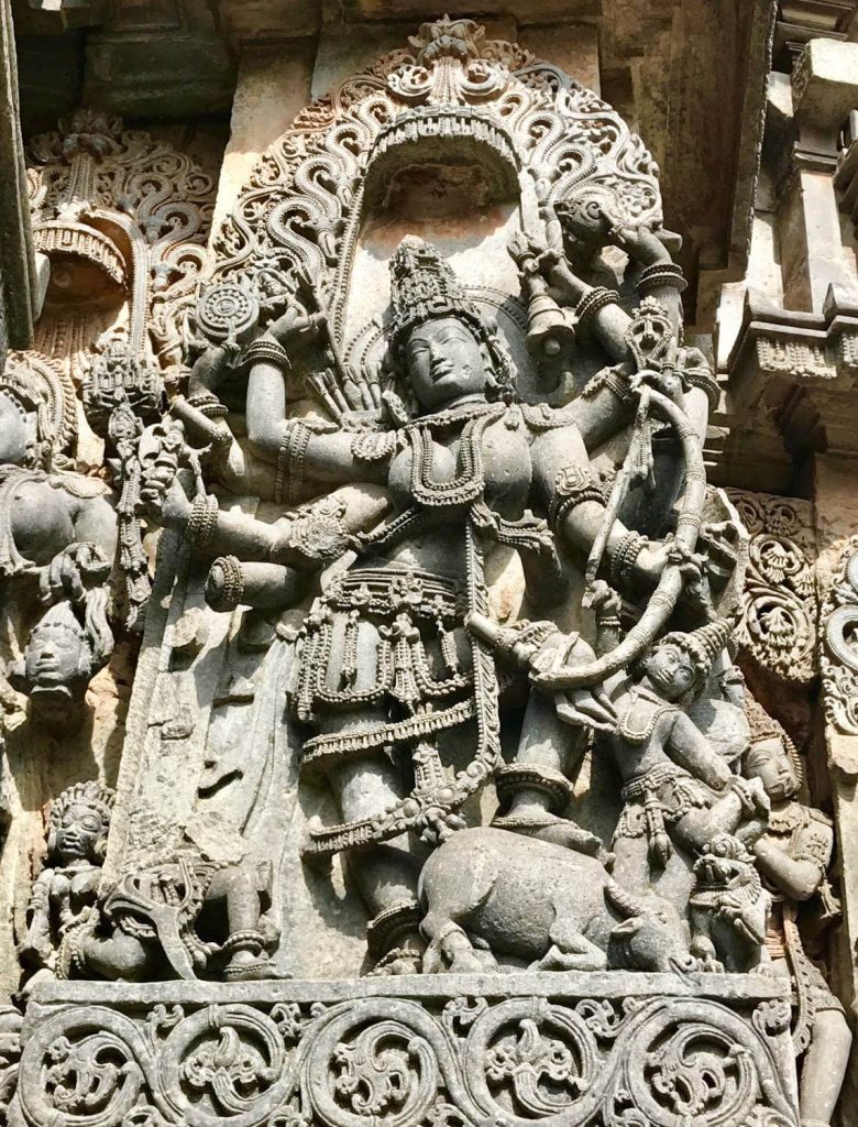 Durga as Mahishasuramardini killing the buffalo demon. Hoysala Empire era sculpture, 12th century. Halebid, Karnataka, India. ©Heather Elton