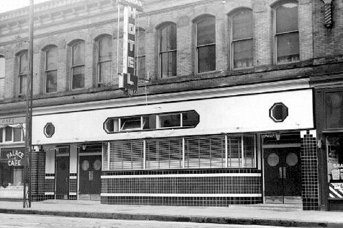 A black and white photograph of the New Fountain Hotel on Cordova Street, Vancouver.